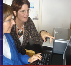 Geraldine Walsh showing a private client how to send and receive e-mails